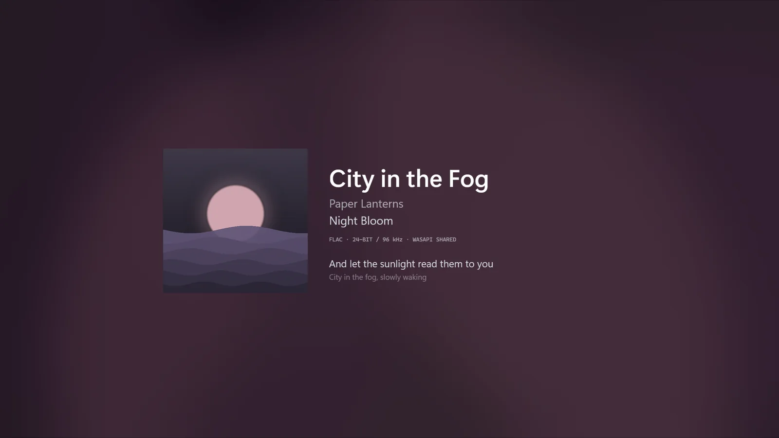 Fullscreen mode showing only the artwork, track details and a misty backdrop.